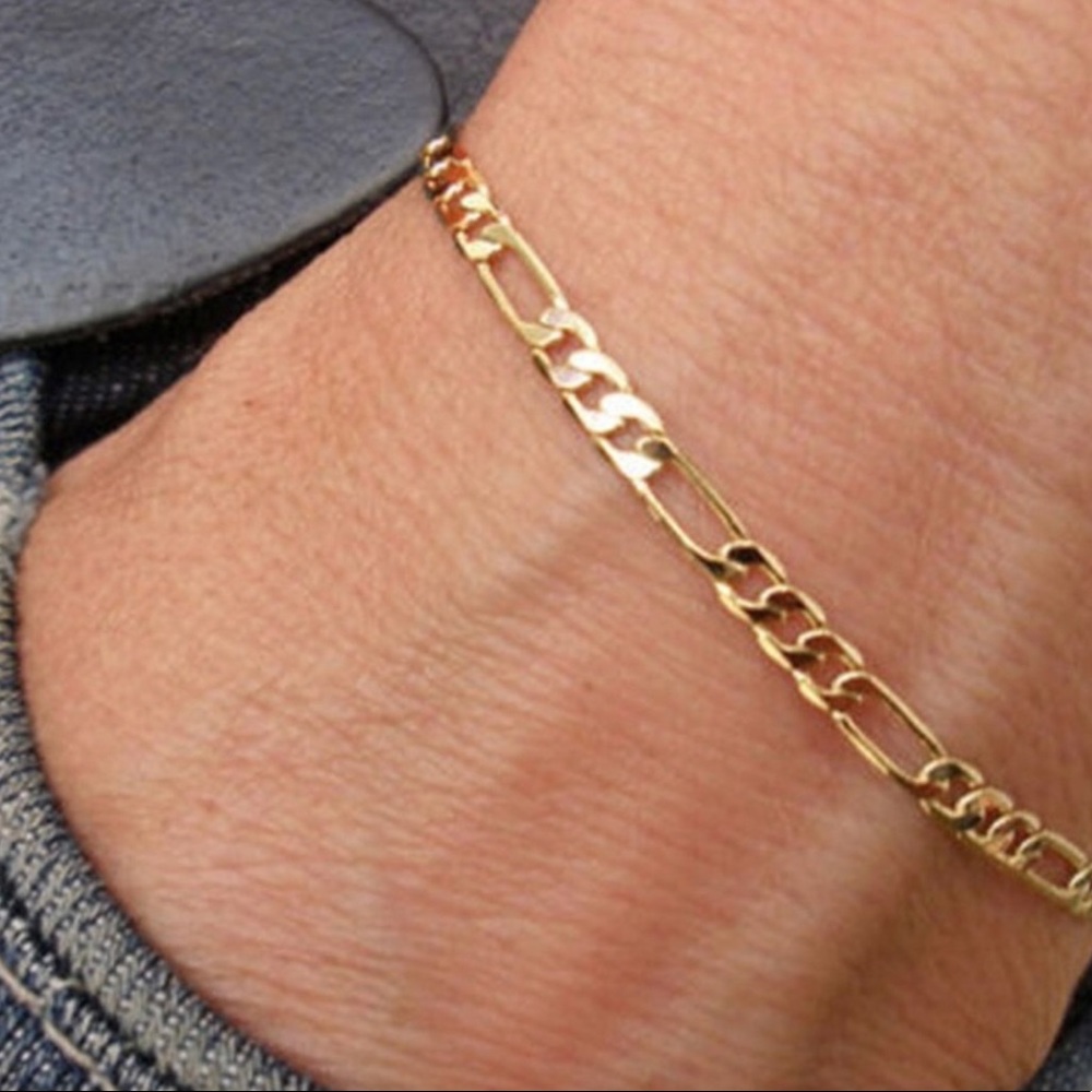 New 18k gold figaro bracelet